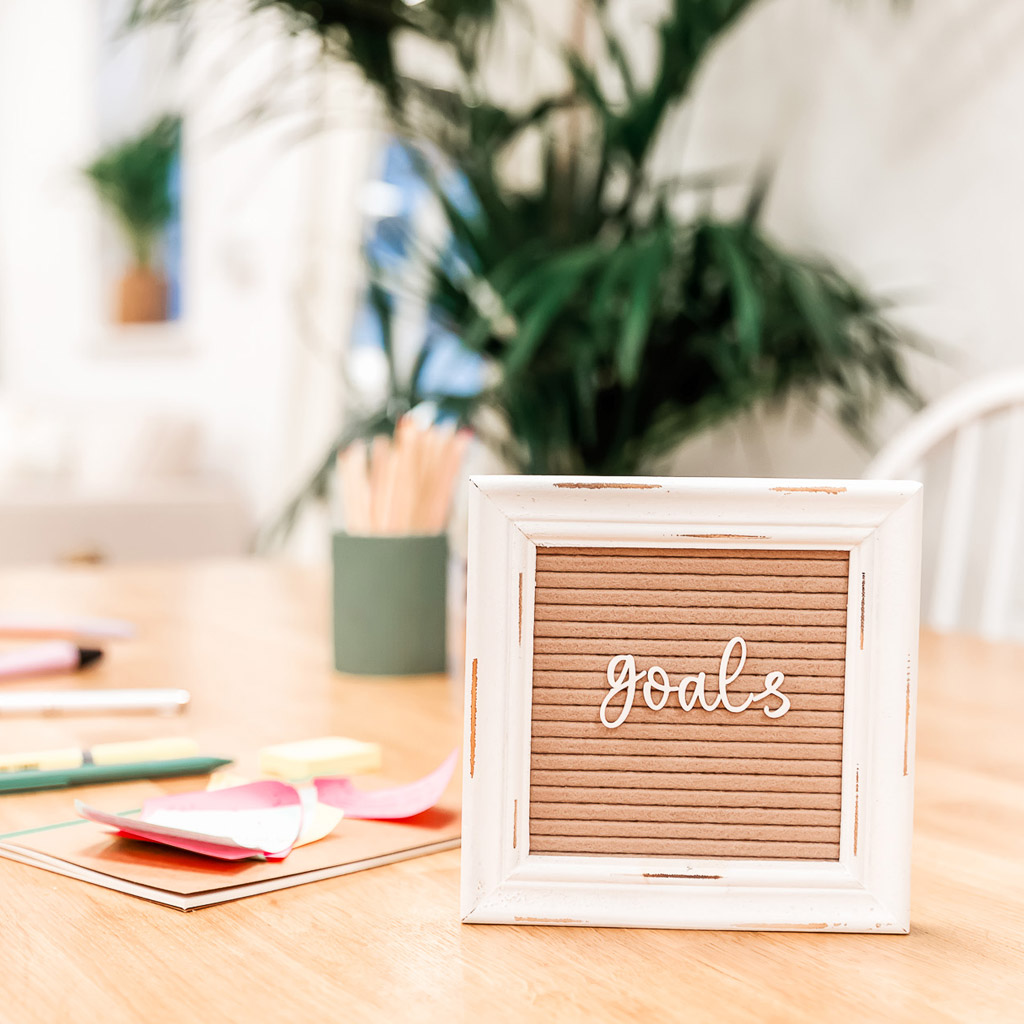Goals pegboard on desk